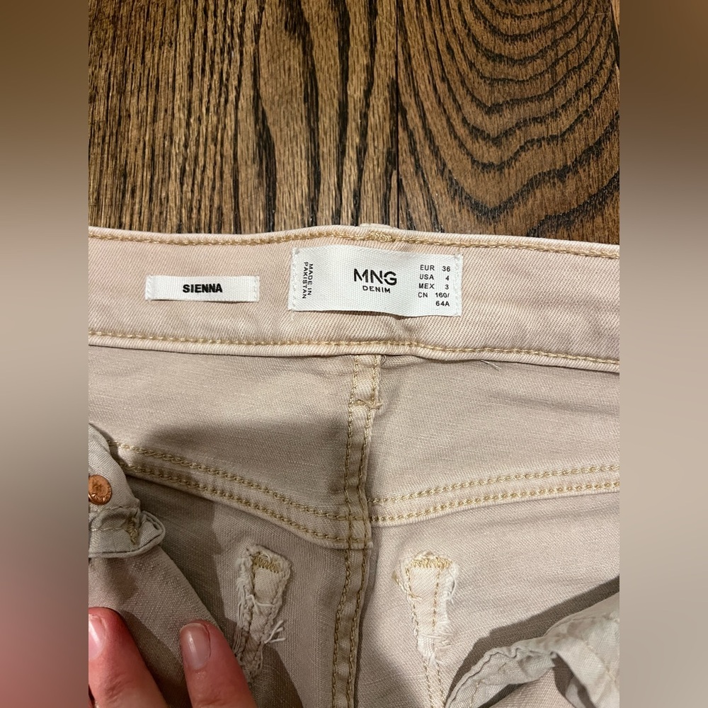 Mango demin. “Sienna” style. Slight crop with raw edge hem